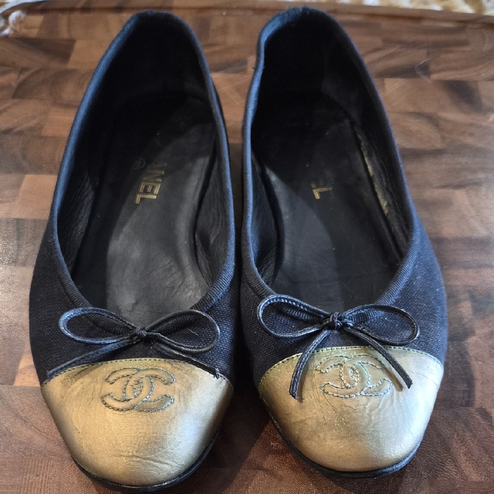CHANEL Black Canvas and Gold Leather Cap-Toe Ballet Flats